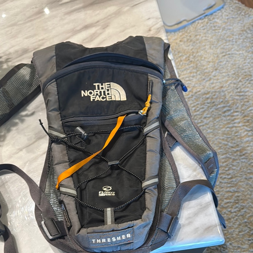 The North Face Black and Gray Small Backpack with Adjustable Straps
